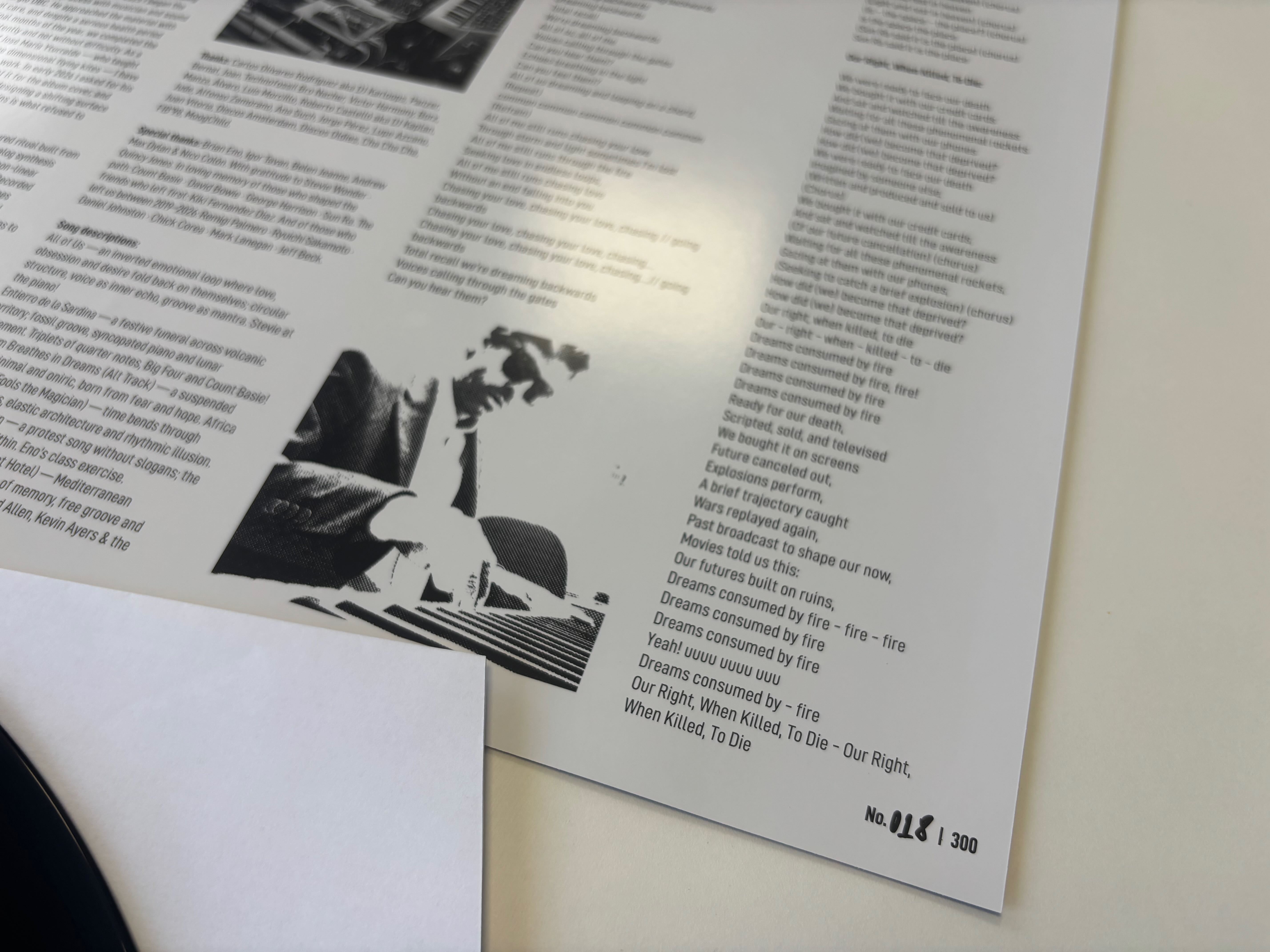 Detail of the lyrics and portrait on the printed insert