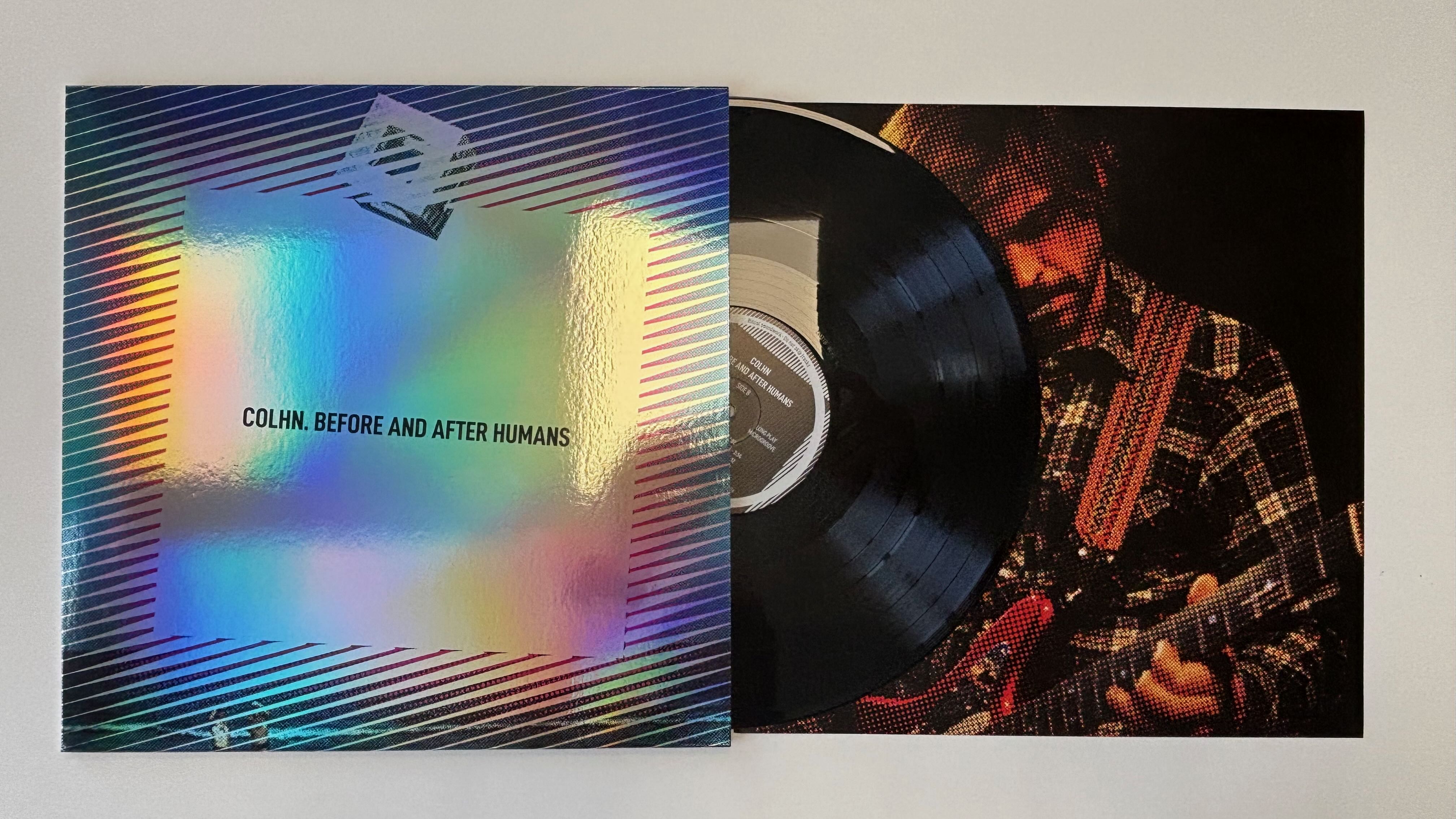Album sleeve, vinyl record and photographic insert